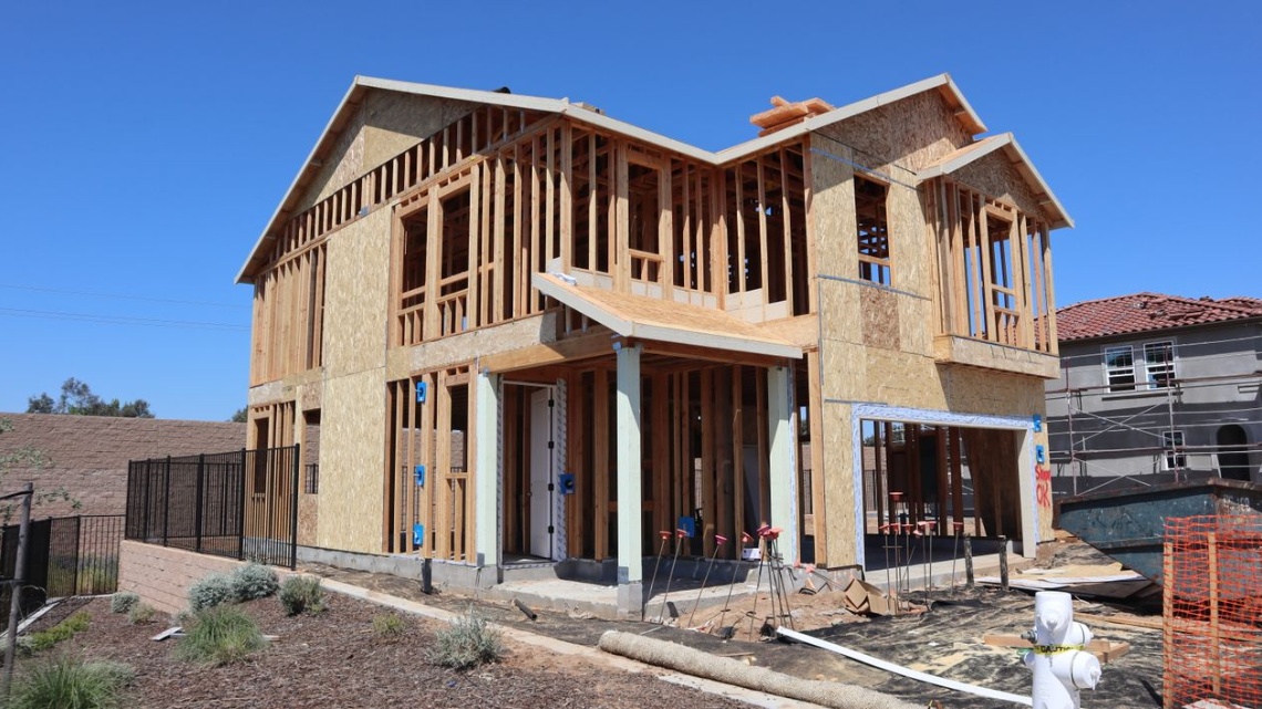 the exterior of a two-story house under construction