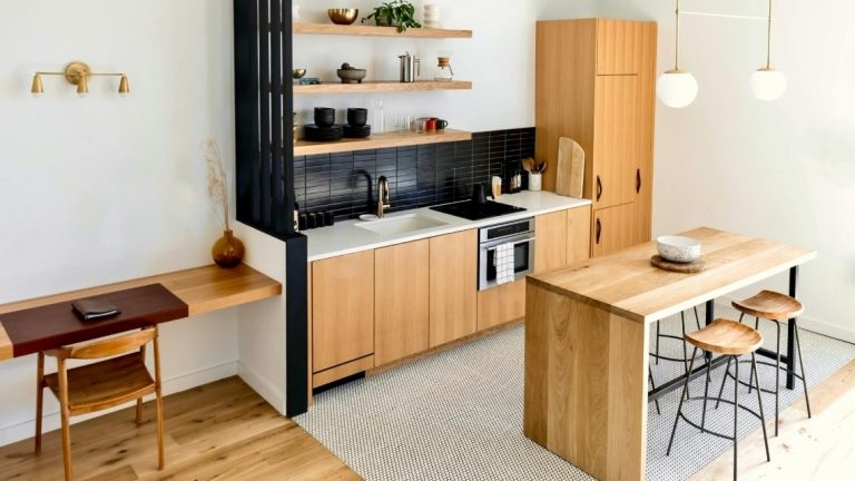 modern kitchen with flat-panel light wood cabinets
