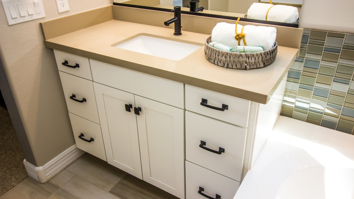 bathroom vanity featuring a neutral beige countertop