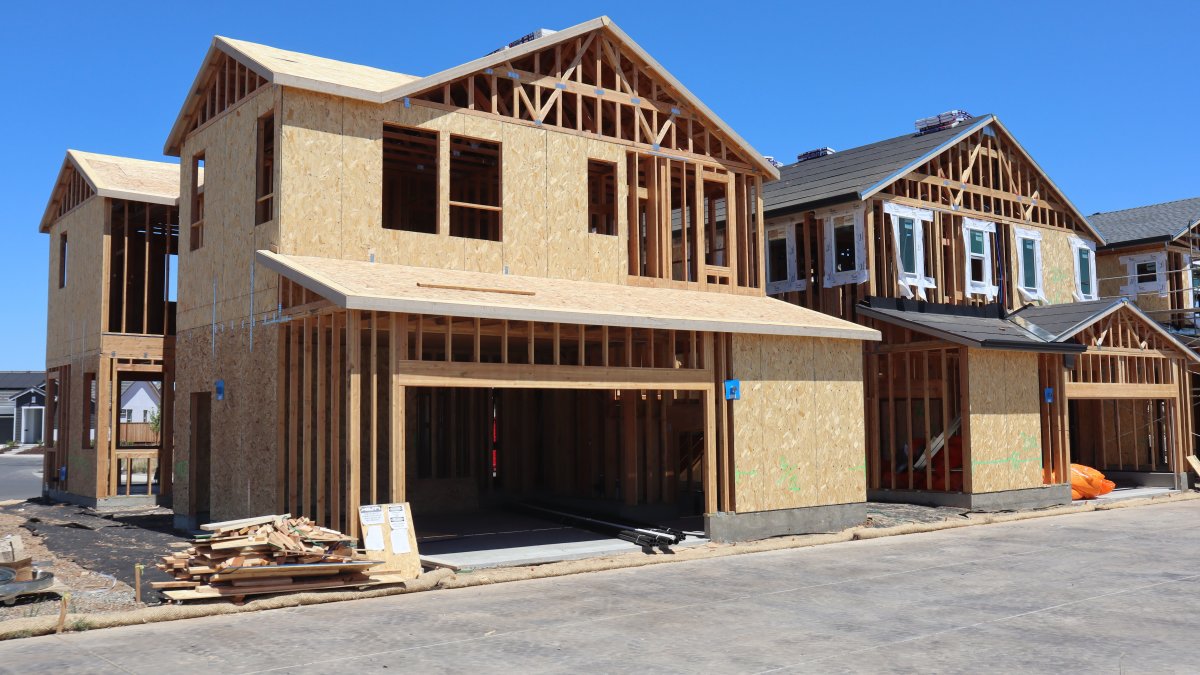Wooden frame of a new house under construction showcasing modern architecture in progress